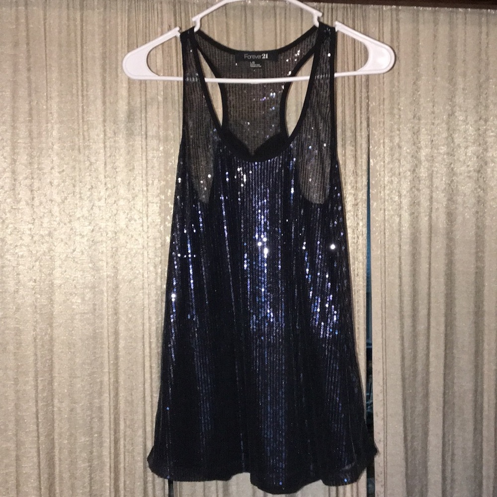 Sexy sequence sleeveless tank top with flare.